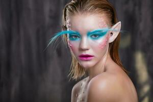 Portrait of a young girl with makeup photo