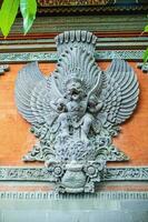 Bas relief of the traditional deity Garuda photo