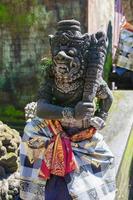 Traditional balinese statue of the deity Barong photo