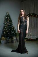 Cute woman dressed in evening dress photo