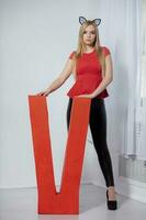 Alluring young woman posing in studio photo