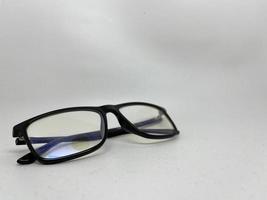 Transparent eyeglasses on a white background photo