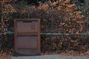 Old metal rusty mailbox photo