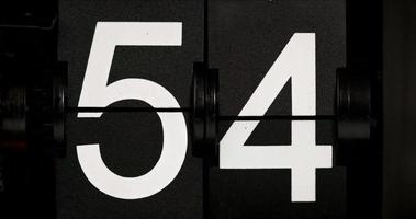 Flip the countdown clock 54, the white numbers change to 55. video