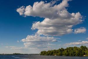 Beautiful white clouds against the blue sky photo