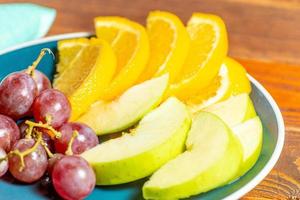 jollof rice with meat - vegetable and fruits photo