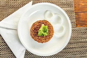 jollof rice with mean - vegetable and fruits photo