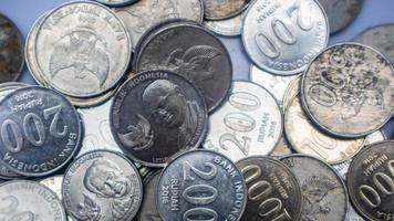 pile of rupiah coins as background photo