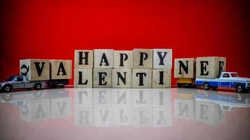 minahasa, Indonesia  January 2023, Happy valentine's day from stacked wooden blocks photo