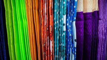 a variety of colorful curtains in the curtain shop photo