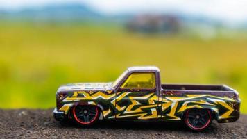 minahasa, Indonesia  January 2023, toy car in the rice field photo