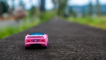 minahasa, Indonesia  January 2023, toy car in the rice field photo