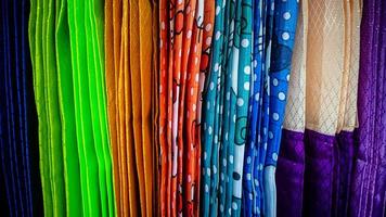 a variety of colorful curtains in the curtain shop photo