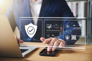 Cybersecurity and privacy concepts to protect data. Lock icon and internet network security technology. Businessmen protecting personal data on virtual interfaces. photo