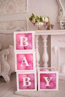 decorative boxes with pink balloons photo