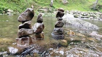 Stone arrangement in river art photo