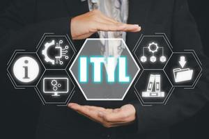 ITIL, Information Technology Infrastructure Library concept, Person hand holding Information Technology Infrastructure Library icon on virtual screen. photo