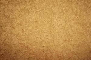 Surface texture of brown speckled wallpaper for background. Old wallpaper texture. Abstract photo