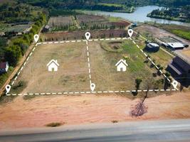 Land plot for building house aerial view, land field with pins, pin location for housing subdivision residential development owned sale rent buy or investment home or house expand the city suburb photo