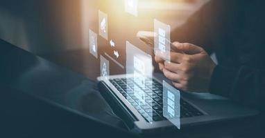 Cloud technology concept Global network of metaverse systems concept, Man hand touch data with internet cloud technology and File Transfer backup copy,Global business  Internet for Telecommunication photo