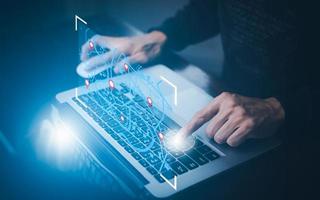 Man using laptop with virtual world and model map with location point , GPS app, icon Travel maps and find places in the online system, all screen graphics are generated,Searching for travel. photo