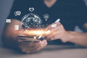 virtual Global Internet connection metaverse concept, Businessman using mobile smartphone, global internet connection application technology and digital marketing, Financial and banking,tech big data. photo