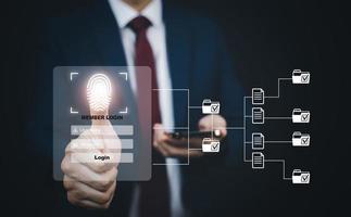 Security password login online concept, businessman using  finger scan and entering username and password of social media, log in with smartphone to an online bank account, data protection from hacker photo