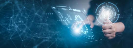Businessman hold brain icon with Artificial Intelligence AI,on big data network machine learning and data on the dark background, artificial intelligence technology, innovation and futuristic. photo