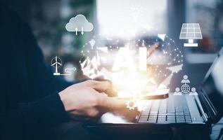 Businessman hold brain icon with Artificial Intelligence AI ,on big data network machine learning and data on the dark background, artificial intelligence technology, innovation and futuristic. photo