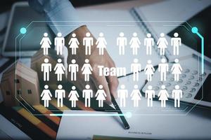 Businessman hand hold Graph Human or people icon on the white background,Technology Process System Business with Recruitment, Hiring, Team Building. Organisation structure, Teamworks photo