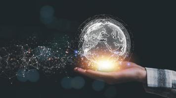 a man and virtual icon,modern cyberspace network technology concept,to communicate and connect information through a global society,innovative and scientific ideas,working through high speed internet photo