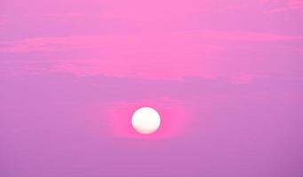 full Moon in the morning on pink sky photo