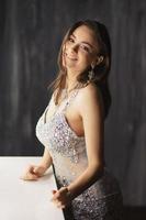 Gorgeous young woman posing in a studio photo