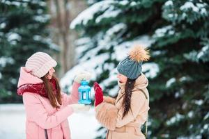 Women having fun on the snow photo