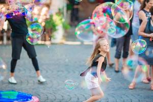 Little girl having fun in the city photo