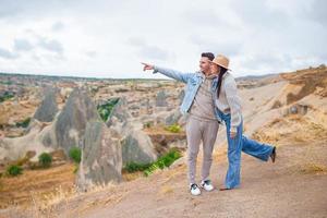 Beautiful young couple traveling photo