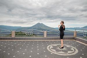 Adorable woman wearing in black dress photo