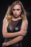 Pretty young lady posing in a studio photo