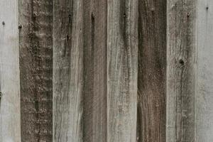 Large background texture of the wall of gray old wooden boards photo