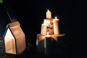 Candlesticks with burning candles create a cozy and warm atmosphere in the house photo