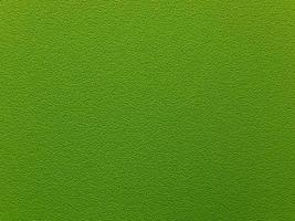 Dark green dense fabric texture.Green textile background. photo