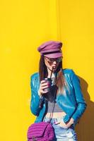 woman in the street drinking morning coffee photo