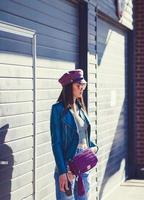 fashion model posing in leather jacket photo