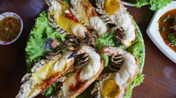 Close up View of Big Grilled Prawn Served with Spicy Seafood Sauce Served in Restaurant. Thai Food video