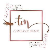 Initial logo TM handwriting women eyelash makeup cosmetic wedding modern premium vector