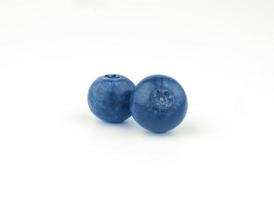 two blueberry fruit on white background photo