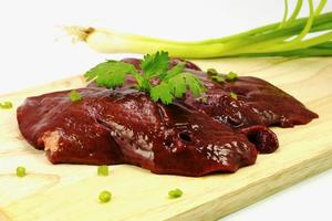 slice raw liver preparation for cooking photo