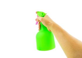 hand holding pump sprayer to washing