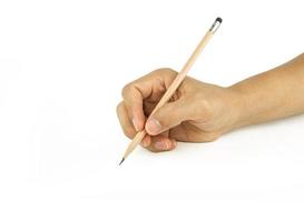 hand holding pencil  writing on white background photo