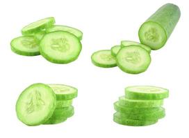 isolated slice cucumber set on white background photo